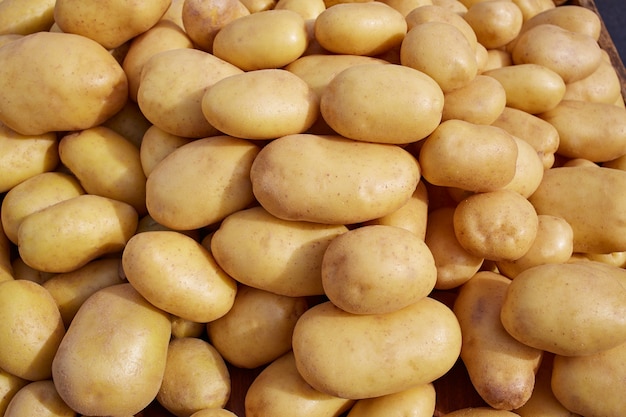 Potatoes background vegetables texture in market