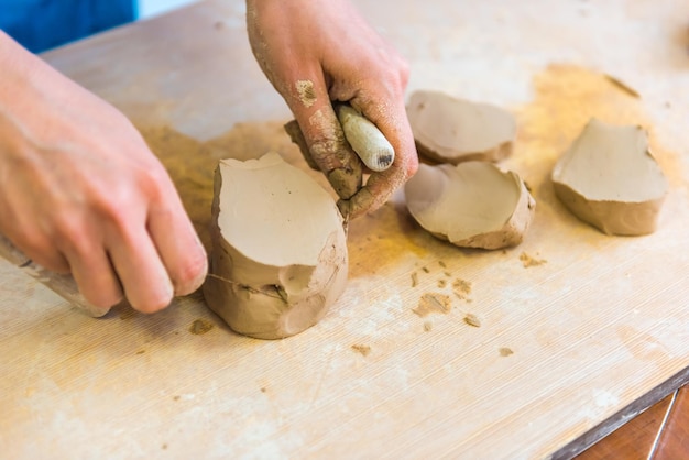 Pottering - creating a clay cup in process. Shot with a small GRIP