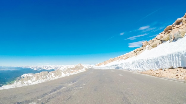 POV point of view -  Driving on alpine road of Mount Evans in Early Summer.