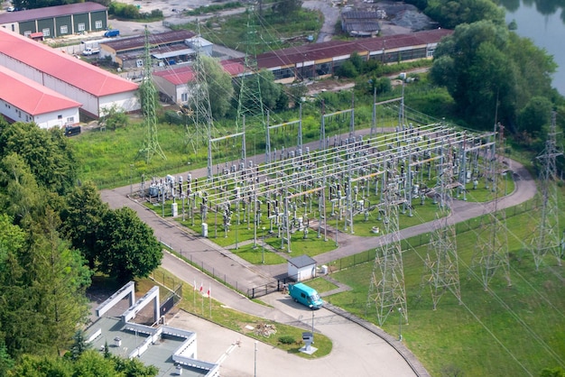 Power plant - transformation station. Multitude of cables and wires. High quality photo from above