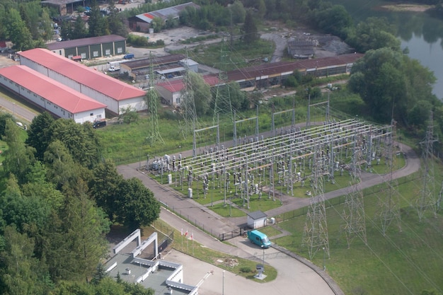 Power plant - transformation station. Multitude of cables and wires. High quality photo from above