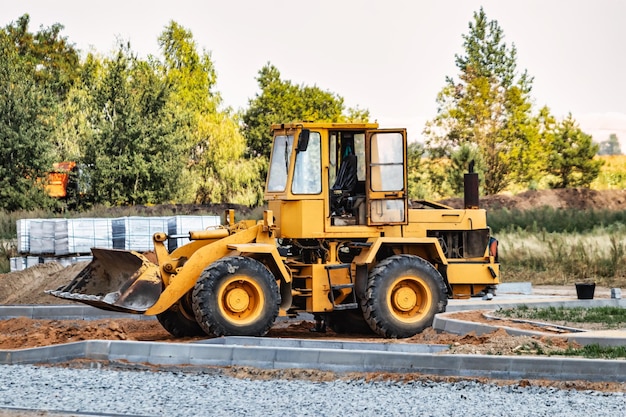 Powerful crawler bulldozer closeup at the construction site Construction equipment for moving large volumes of soil Modern construction machine Road building machine