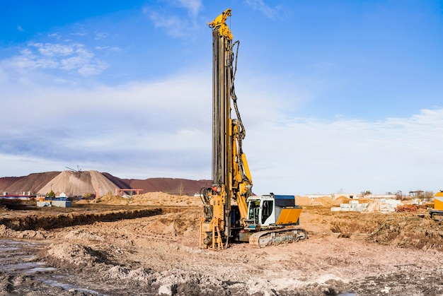 A powerful drilling rig for peeling at a construction site. Operation of the drilling rig in northern conditions. Pile foundations. Bored piles.