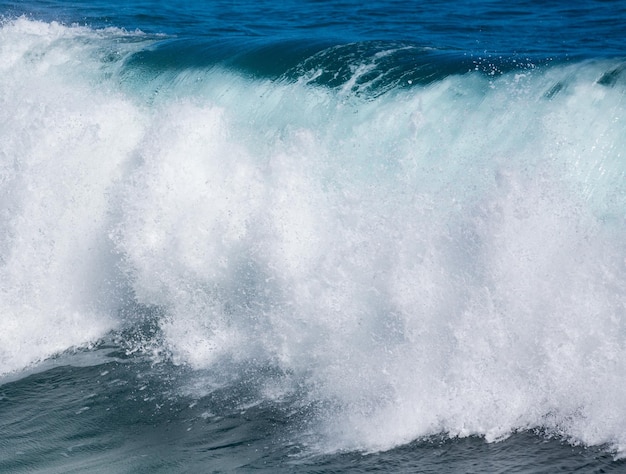 Powerful waves break at Lumahai Beach Kauai