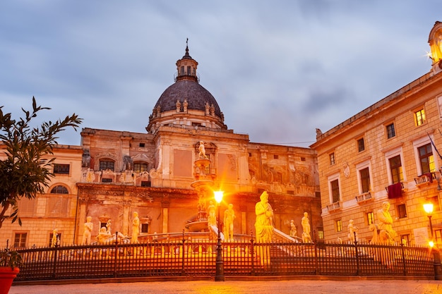 Praetorian Fountain located in Piazza Pretoria at sunset