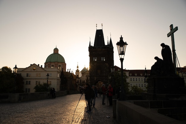 PRAGUE CZECH REPUBLIC September 22 2018 tourists in the morning on Charles bridge in Prague