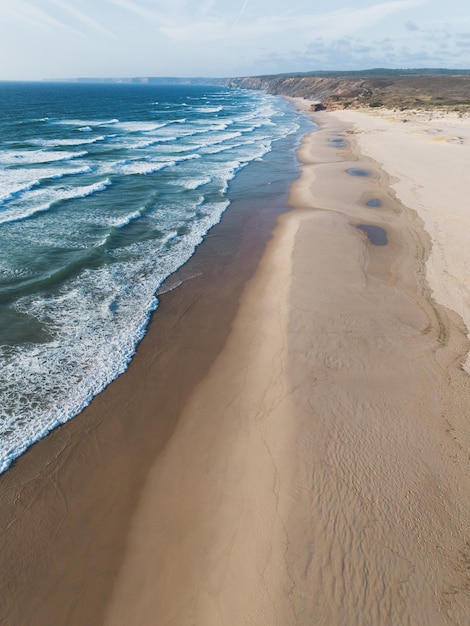 Praia da Bordeira wild beach in Algarve Portugal