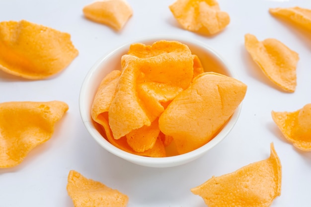 Prawn crackers on white background. Shrimp crispy rice snack