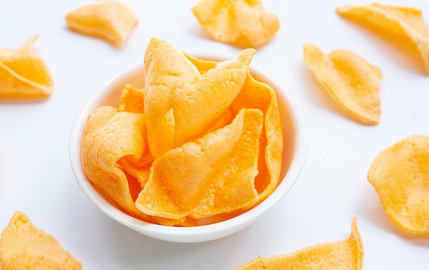 Prawn crackers on white background. Shrimp crispy rice snack