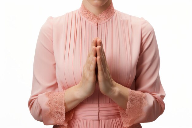 Photo praying hands of a woman against a white background