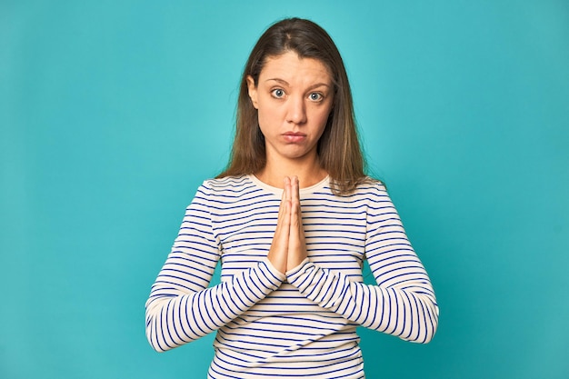 Praying showing devotion religious person looking for divine inspiration