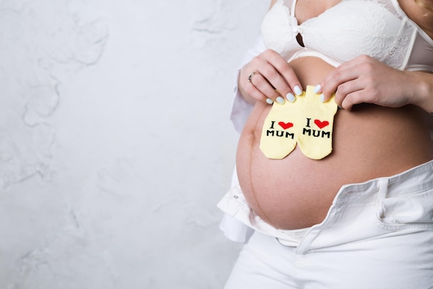 Pregnant woman and baby socks