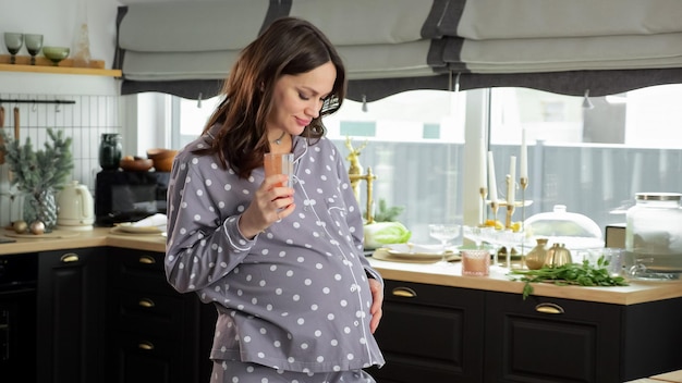 Pregnant woman drinks squeezed juice caring about health