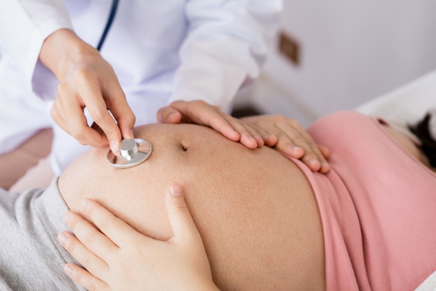 Pregnant Woman and Gynecologist Doctor at Hospital