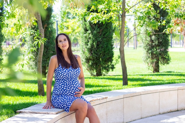 Pregnant woman in the park