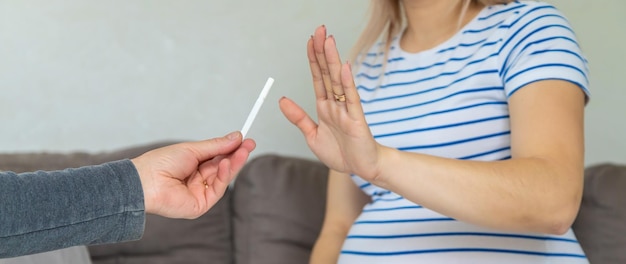 The pregnant woman refuses to smoke Selective focus