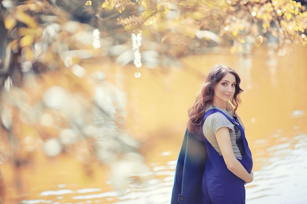 Pregnant woman on a walk in the park