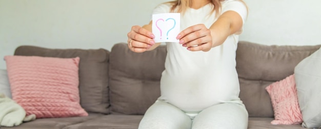 Pregnant woman who will be the question mark Selective focus