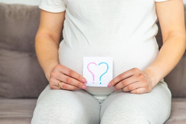 Pregnant woman who will be the question mark Selective focus