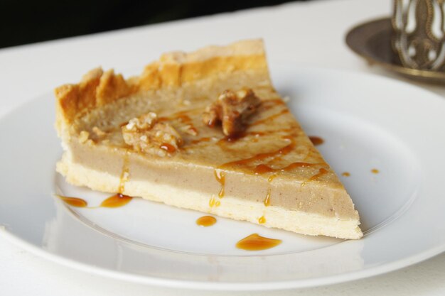 Premium almond tart in a French patisserie.