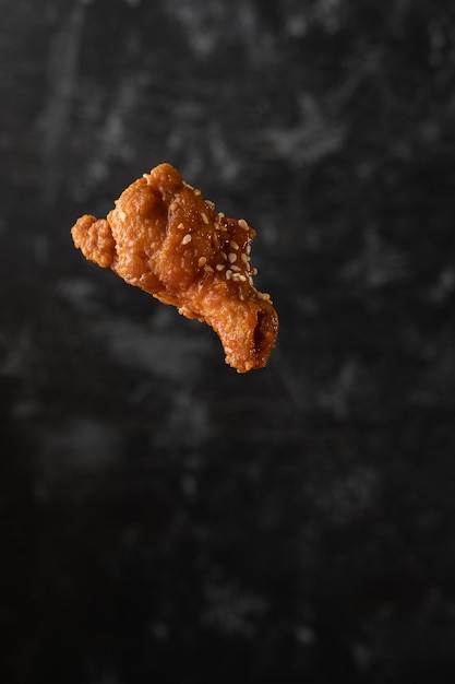 Photo premium photo of a piece of chicken wing