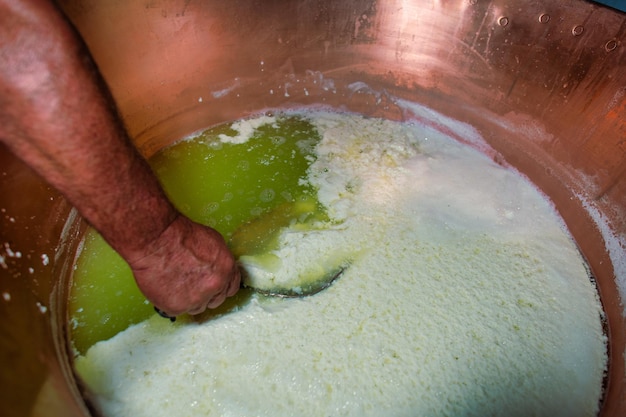 Preparation of cheese in large pot