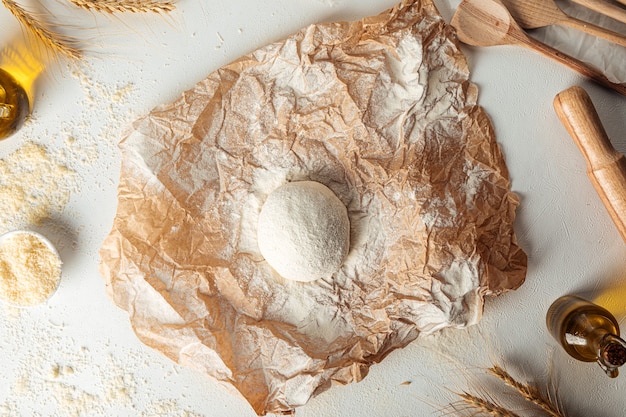 Preparation of dough for kneading pizza cooking