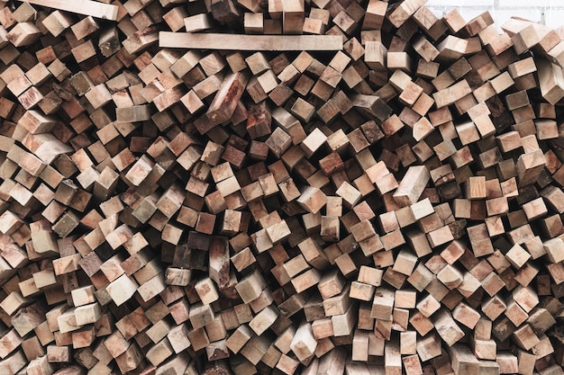 Preparation of firewood for the winter firewood background Stacks of firewood in the forest