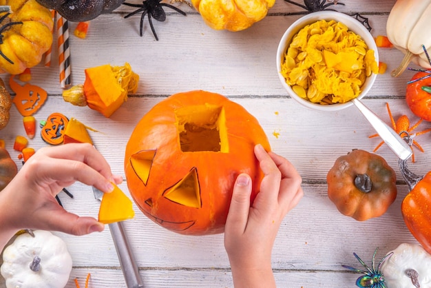 Preparation for Halloween with carving pumpkin