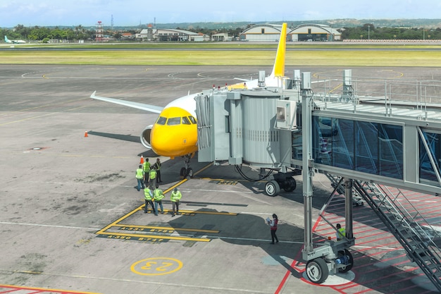 Photo preparation of a passenger aircraft by ground services at the airport