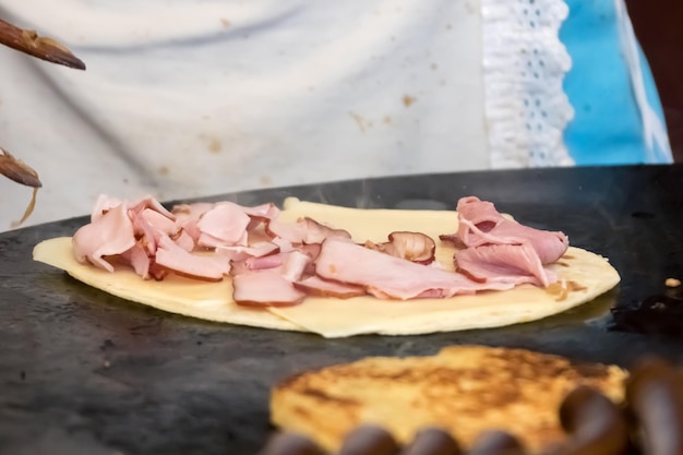 Preparation of pita bread with meat