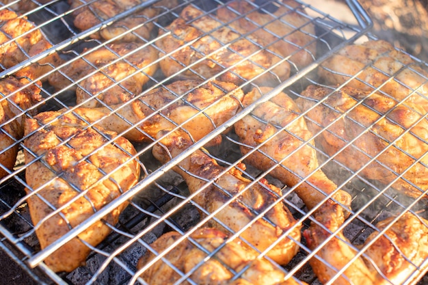 Photo preparing barbeque during holiday on picnic on charcoal for family time and leisure time