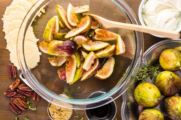 Photo preparing fig bruschetta with organic california figs.