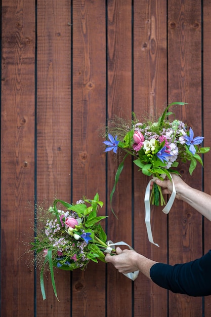 Preparing flowers for the wedding celebration for the bride mothers and witness