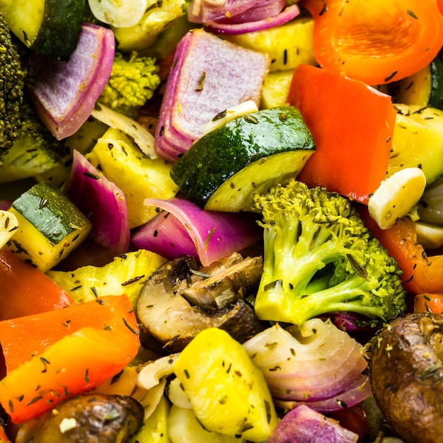 Preparing fresh roasted mixed vegetables for dinner.