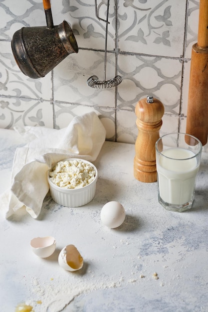 Preparing homemade food from farm products. Pie with cottage cheese, dumplings, khachapuri.