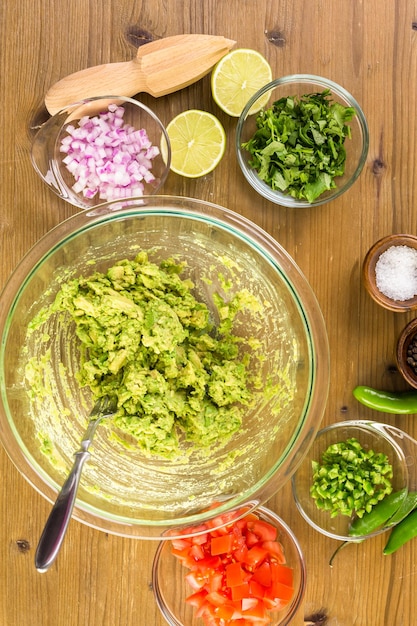 Preparing homemade guacamole from organic produce.