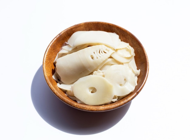 Preserved bamboo shoot slices on white background