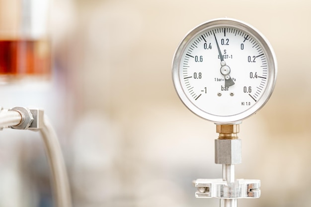 Pressure gauge on the tank in the laboratory