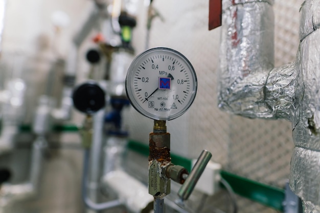 Pressure sensor in an industrial boiler room barometer in the heating system closeup