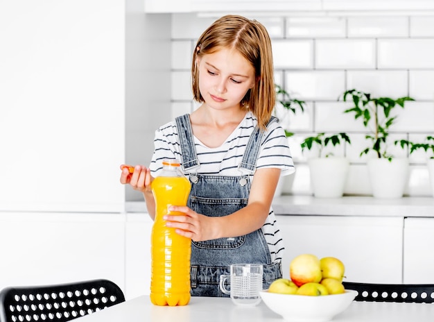 Preteen girl at kitchen