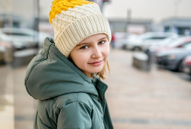 Preteen girl street portrait in city