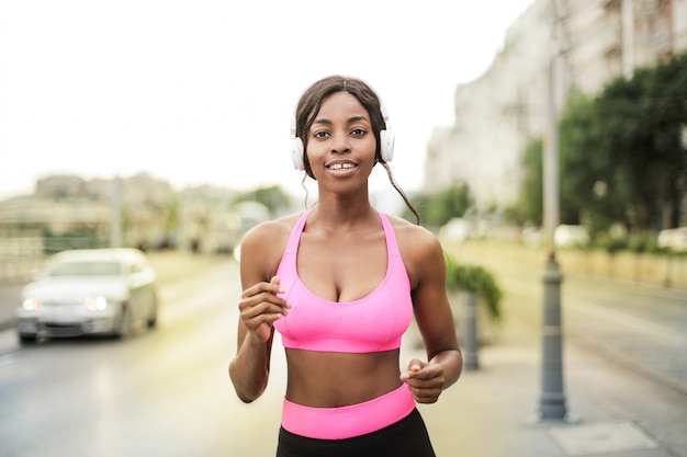 Pretty Afro girl jogging