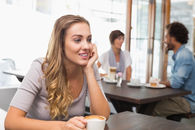 Pretty blonde enjoying a coffee