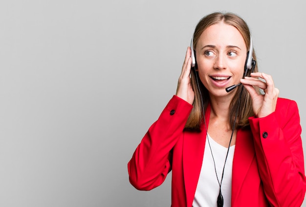 Pretty blonde woman telemarketer concept