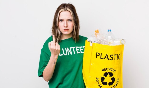 Pretty caucasian woman feeling angry annoyed rebellious and aggressive ecology concept