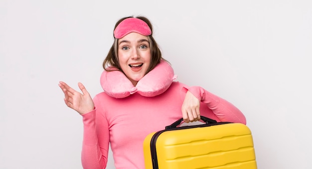 Pretty caucasian woman feeling happy surprised realizing a solution or idea flight passenger concept