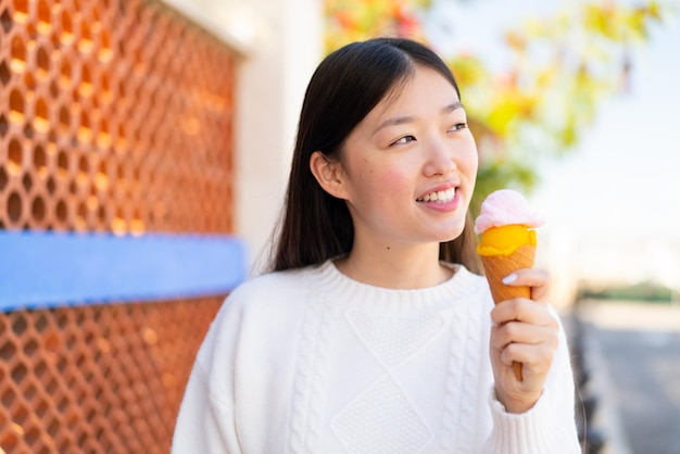 Pretty Chinese woman at outdoors