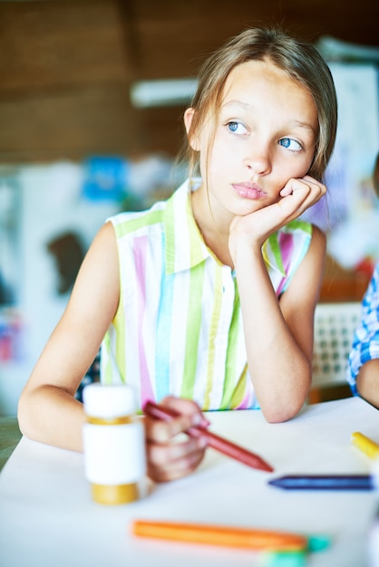 Pretty Girl Daydreaming in Class