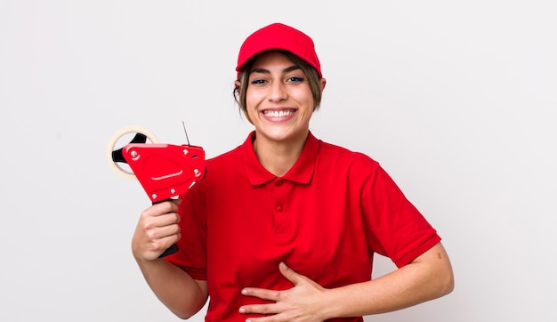 Pretty hispanic woman laughing out loud at some hilarious joke packer concept